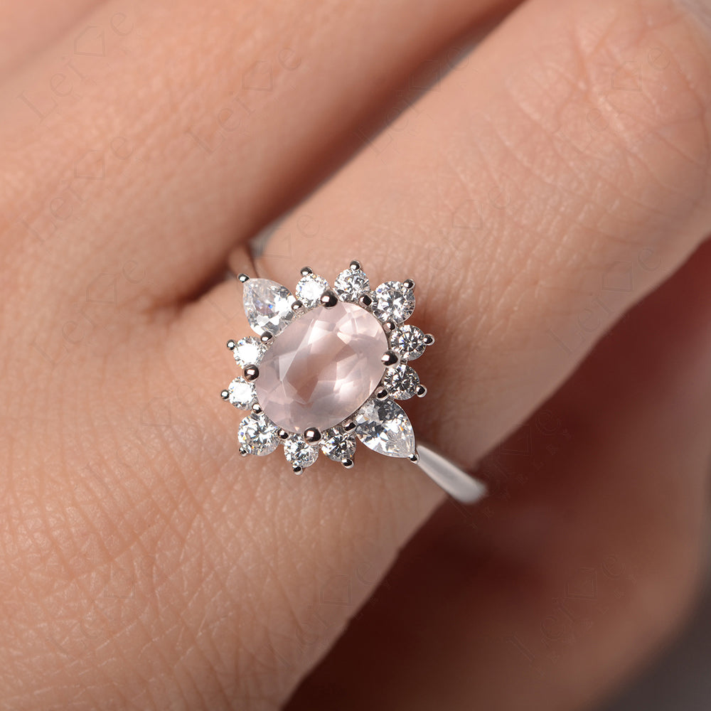 Oval Cut Rose Quartz Ring With Pear Side Stone