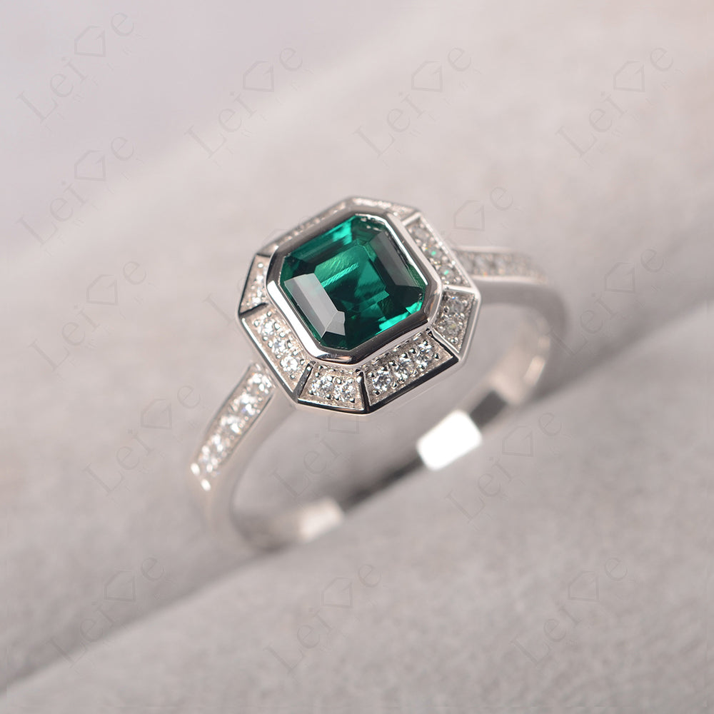 Asscher Cut Emerald Bezel Set Halo Engagement Ring