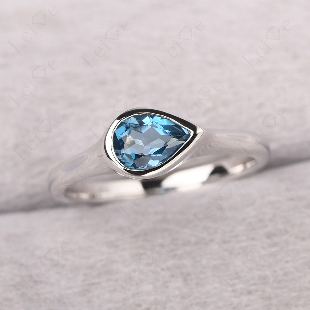 Horizontal Pear London Blue Topaz Engagement Ring