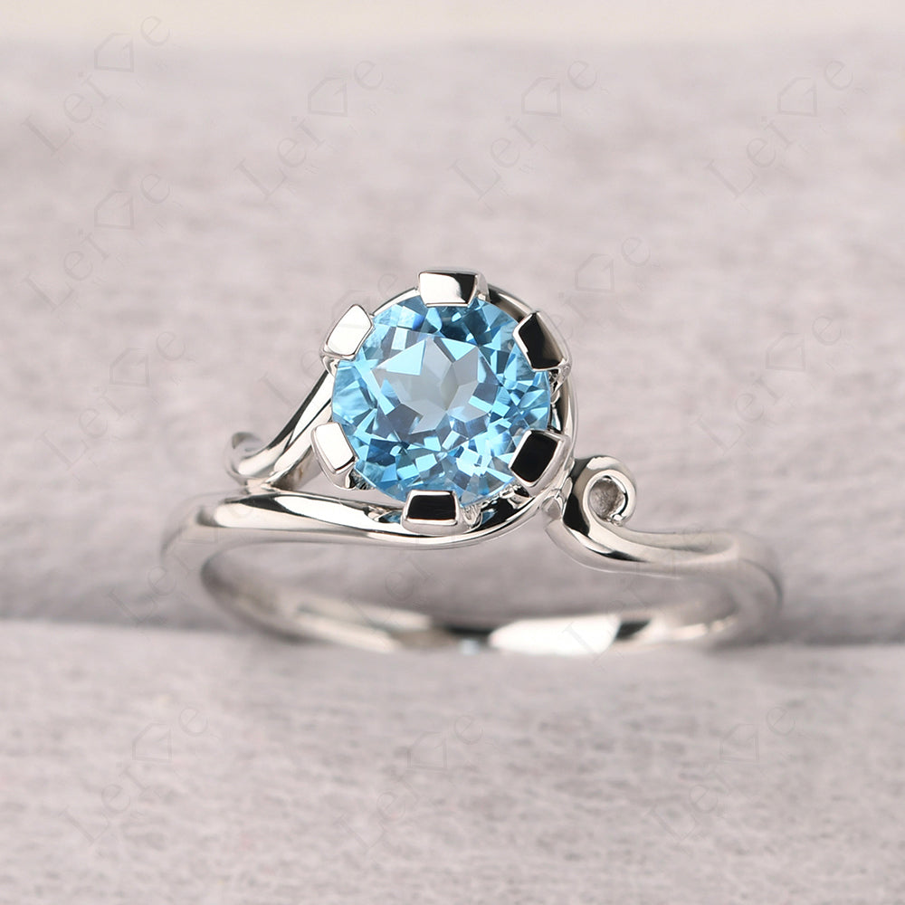 Non-traditional Swiss Blue Topaz Ring