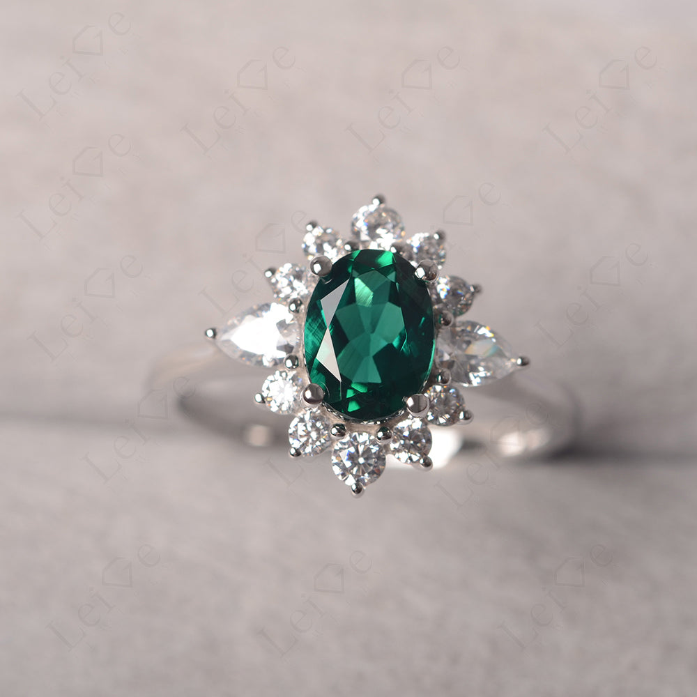 Oval Cut Emerald Ring With Pear Side Stone