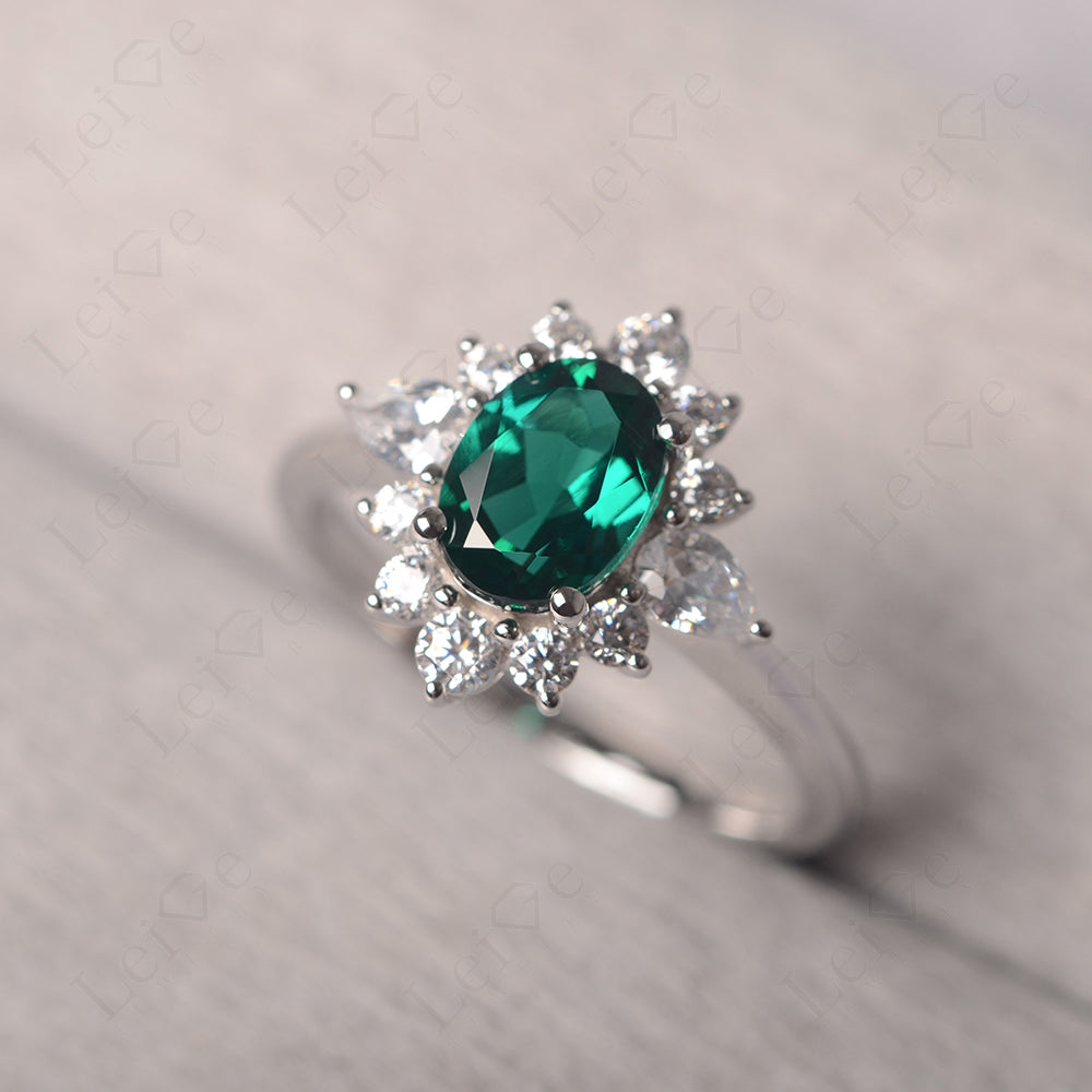 Oval Cut Emerald Ring With Pear Side Stone