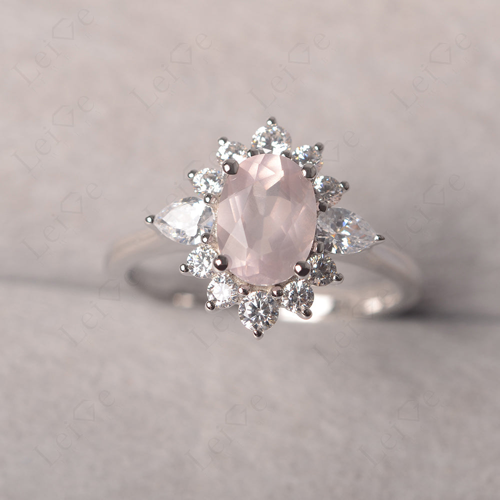 Oval Cut Rose Quartz Ring With Pear Side Stone