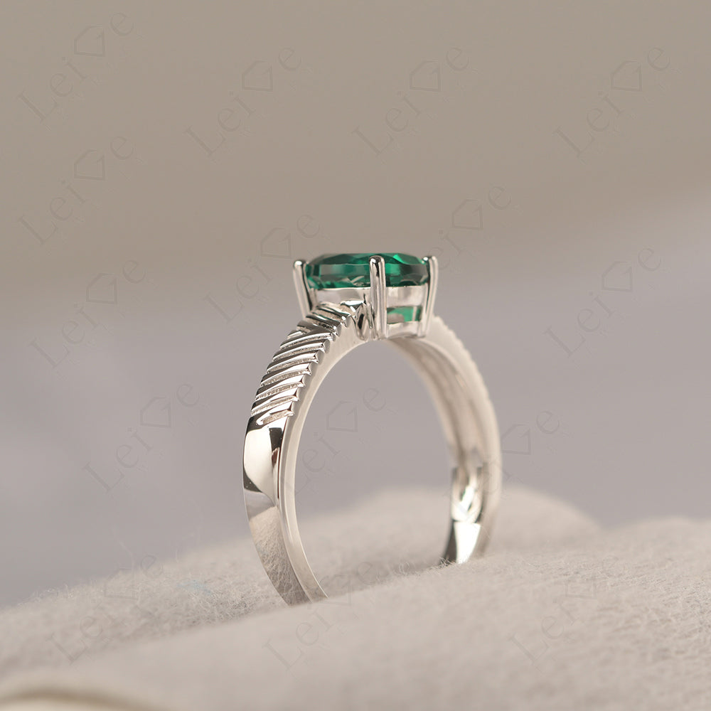Oval Emerald Wide Band Engagement Ring