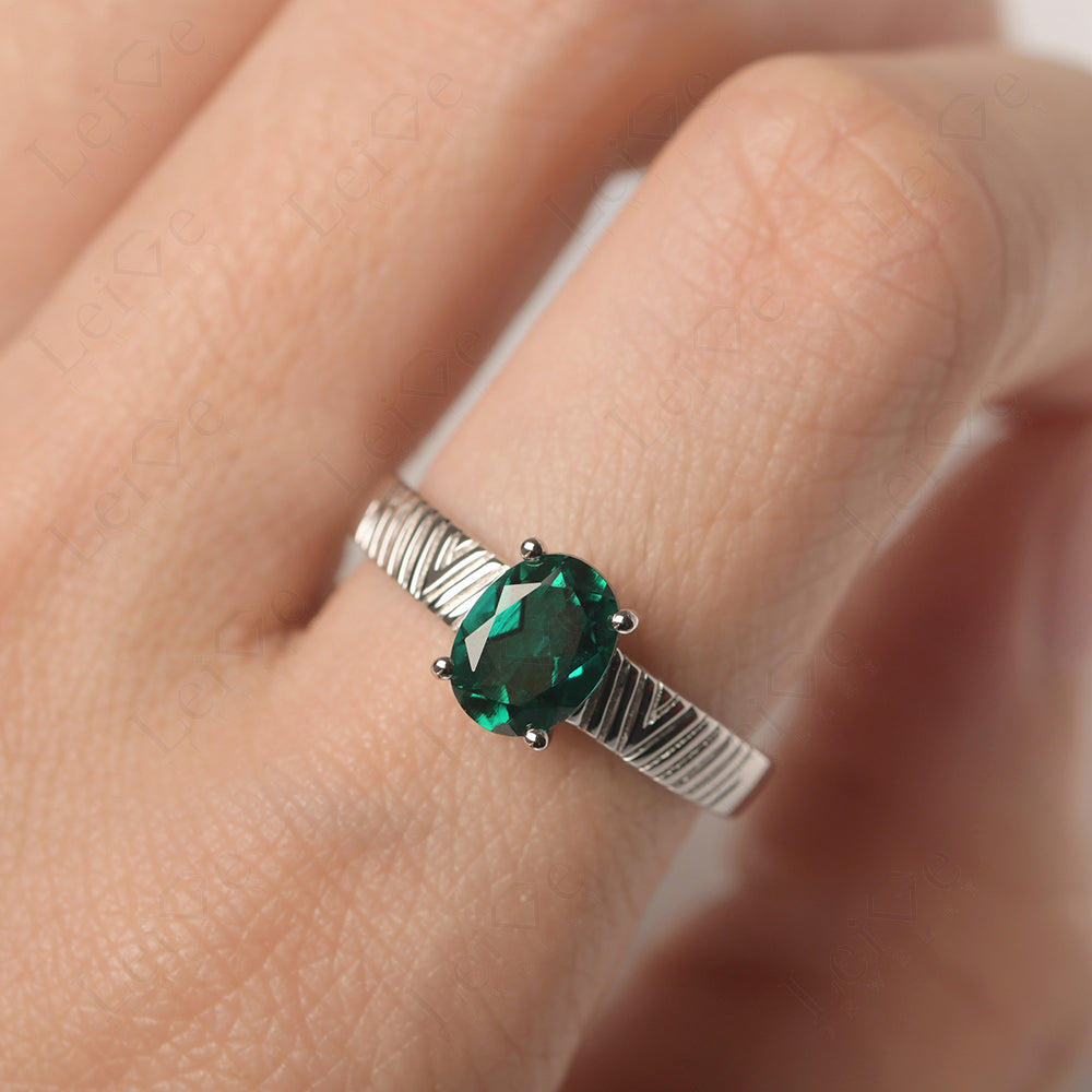 Oval Emerald Wide Band Engagement Ring
