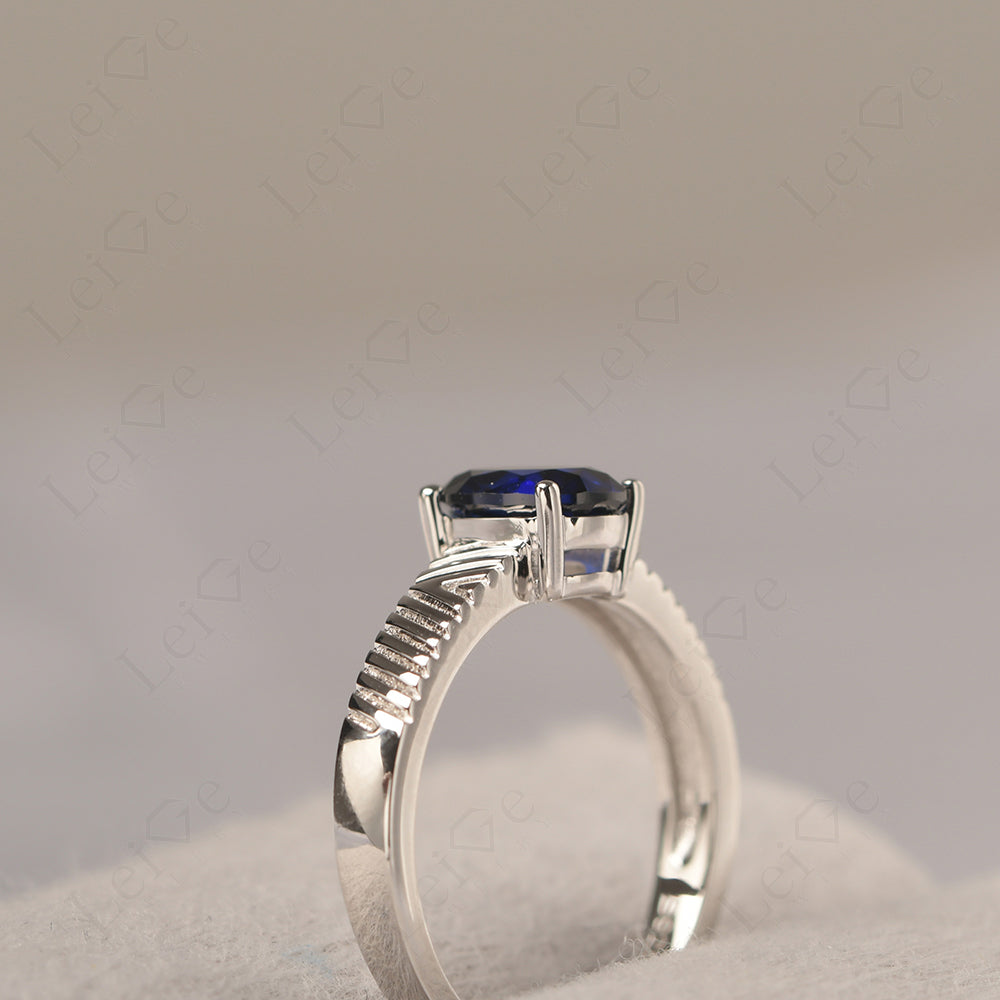 Oval Sapphire Wide Band Engagement Ring