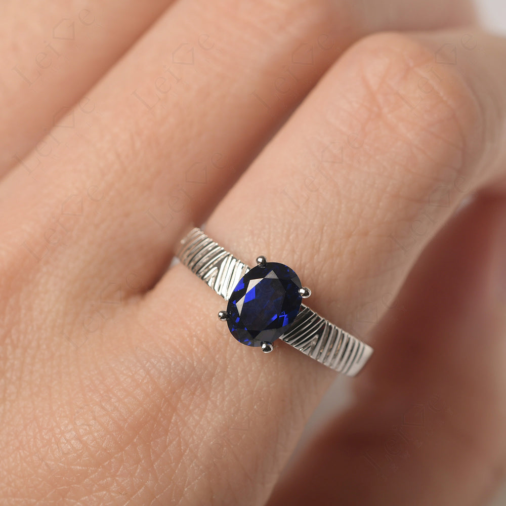 Oval Sapphire Wide Band Engagement Ring